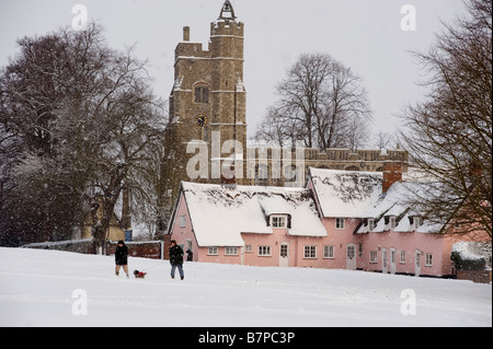 Heavy snow falling on the green and the Church of St Mary in the beautiful English village of Cavendish Suffolk Britain 3 febru Stock Photo