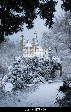 Snow covers gardens of the Royal Pavilion Brighton in the early morning light of an English winter Stock Photo