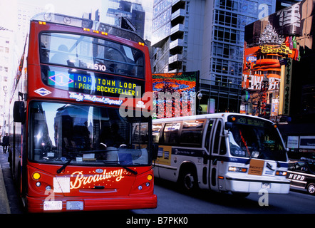 New York City Broadway and Times Square Red Double Decker Tour Bus and New York City Bus Line. Traffic congestion. USA Stock Photo