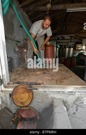 Souma (Tsipouro) destillation in Greece Stock Photo