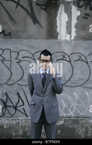 A businessman making a call with the cellphone Stock Photo