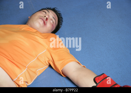 A man knocked down Stock Photo