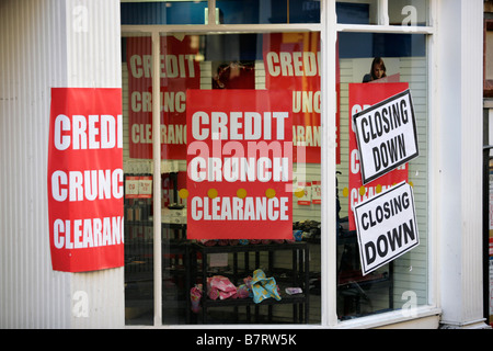 Closing down posters in a shop window in Shrewsbury, Shropshire, UK Stock Photo
