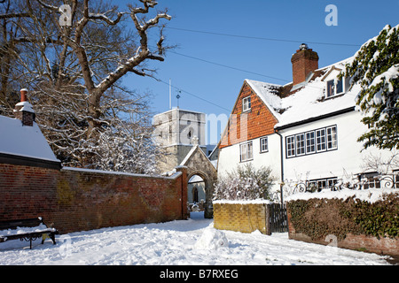 Betchworth Surrey St Michael's churchyard entrance in the snow Stock Photo
