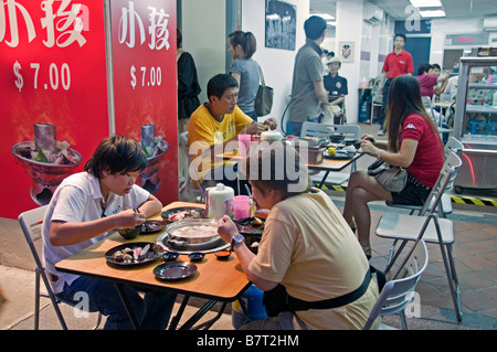 Singapore Chinatown chinese fish restaurant food street night market centre Stock Photo