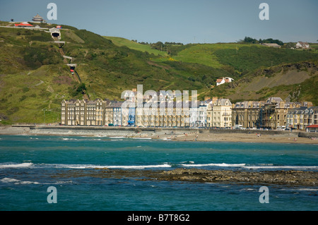 View across sea to North Beach, and the colourful terraced houses of Victoria Terrace in Aberystwyth. Wales. UK Stock Photo