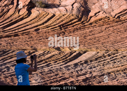 Woman photographing Zion National Park Utah USA Stock Photo