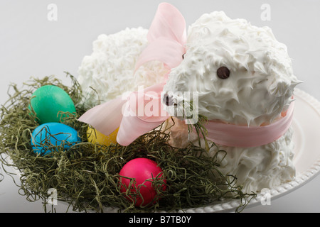 The Easter Holiday with the traditional sweet lamb cake and chocolate eggs pictures images photos photograph horizontal in USA US hi-res Stock Photo