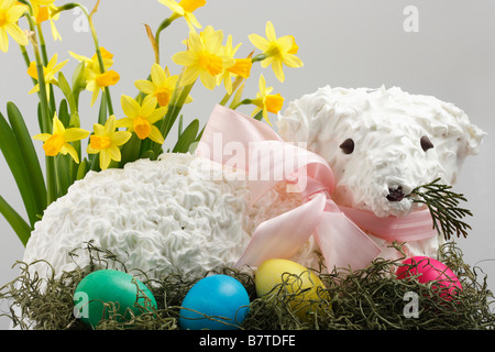 The Easter Holiday with the traditional sweet lamb cake and chocolate eggs pictures images photos photograph horizontal in USA US hi-res Stock Photo