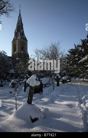 St Dunstans Churchyard in snow Cheam Surrey England Stock Photo