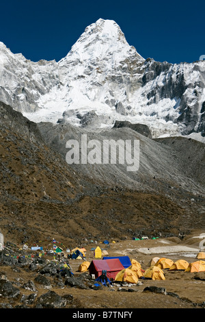 Majestic Amadablam mountain in background and alpinist base camp seen in Khumbu region Everest valley Nepal Stock Photo