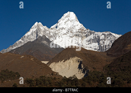 Majestic Amadablam mountain in background seen in Khumbu region Everest valley Nepal Stock Photo