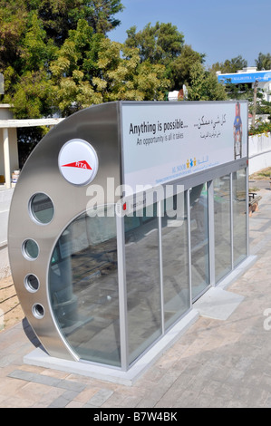 Dubai air conditioned bus shelter with bilingual advertising panel Stock Photo