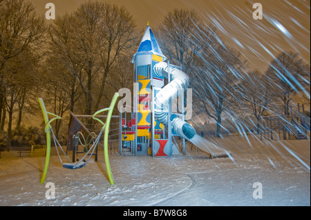 Playground in a snowstorm, painted with light Stock Photo