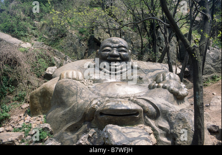 Zijinshan Tuotuo park Stone sculpture of Laughing Buddha Large fat figure ARCHIVED WITHDRAWN NANJING JIANGSU CHINA Stock Photo