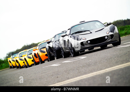 A row of Lotus sports cars at the Lotus factory Norfolk UK Stock Photo