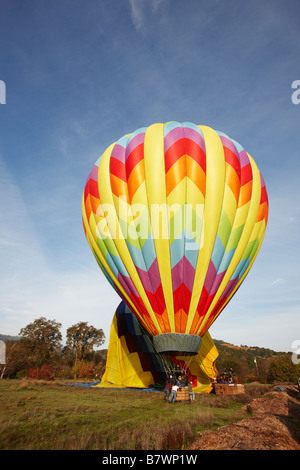 Hot air balloon lands in Napa Valley. California, USA. Stock Photo