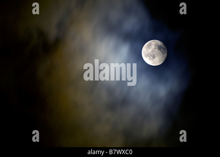 MOON SHOT  IN A CLOUDY NIGHT SKY Stock Photo