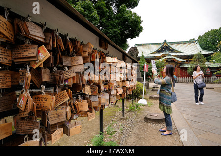 Ema (good wishes written on wooden plates) in front of Main Hall. Ueno Toshogu Shinto Shrine. Ueno Park. Tokyo. Japan Stock Photo