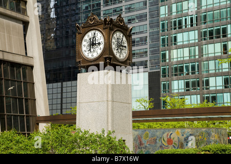 ILLINOIS Chicago Four Seasons mosaic mural by Marc Chagall in First National Plaza and clock Stock Photo