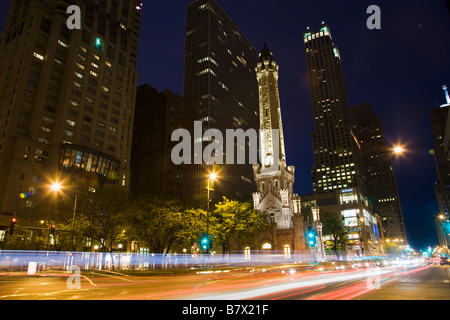 ILLINOIS Chicago Water Tower building on Michigan Avenue at dusk Water Tower Place and buildings on Magnificent Mile Stock Photo