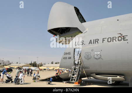 The forward section of the C-5 Galaxy lifts open Stock Photo