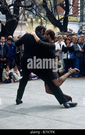 San Telmo Tango Two dancers performing dance in front of crowd spectators BUENOS AIRES ARGENTINA Stock Photo