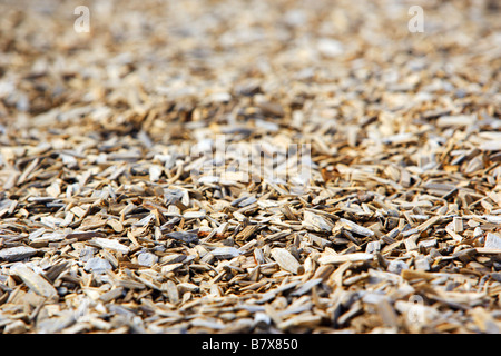 Wooden Bark Barkground in a park play area Stock Photo