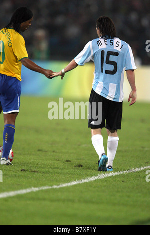 Ronaldinho bra lionel messi arg hi-res stock photography and