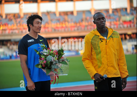 L to R Nobuharu Asahara JPN Usain Bol JAM SEPTEMBER 23 2008 Athletics Jamaicas Usain Bolt Congratulates Japans Nobuhara Asahara Stock Photo