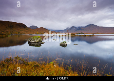 Stormy skies over Lochan Na H Achlaise on Rannoch Moor in Autumn Highlands Scotland Stock Photo