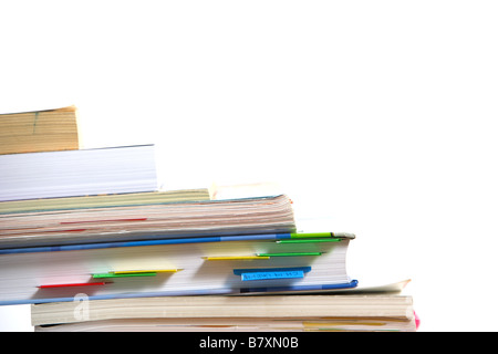 Stack of books falling off a school desk Stock Photo