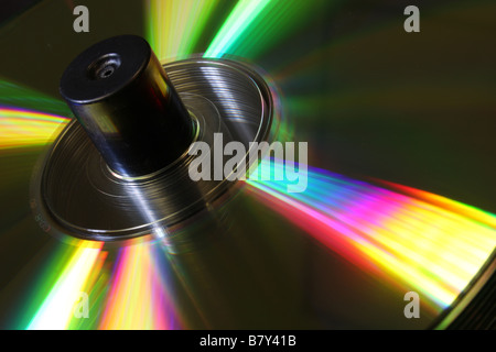 Stack of CD's on a spindle lit with coloured lighting Stock Photo