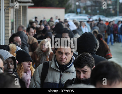 People queue up at a job center in Madrid Spain Stock Photo