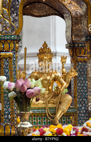 Erawan buddhist shrine on the forecourt of the upmarket Erawan shopping mall Pathumwan district in central Bangkok Thailand Stock Photo