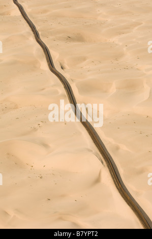 US-Mexico Border fence, AERIAL, Imperial Dunes near Calexico, California Stock Photo