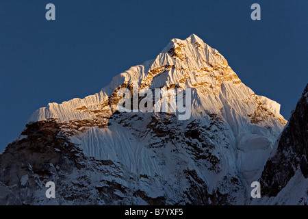 Sunset on Amadablam mountain range as seen from Dingboche in Khumbu region Everest valley Nepal Stock Photo