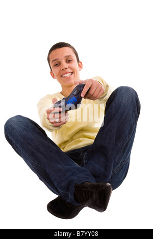 young men having fun playing with a joy pad selective focus Stock Photo