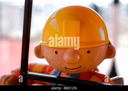 Workman and digger children's ride Stock Photo