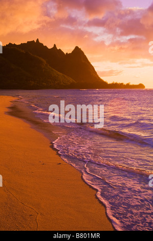 Evening light on Na Pali Coast spires from Tunnels Beach Island of Kauai Hawaii Stock Photo