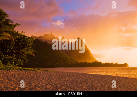 Evening light on Na Pali Coast spires from Tunnels Beach Island of Kauai Hawaii Stock Photo