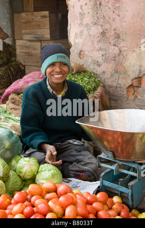Boy sells Fruit and vegetables on sale Food Market Jhunjhunu Rajasthan India Stock Photo