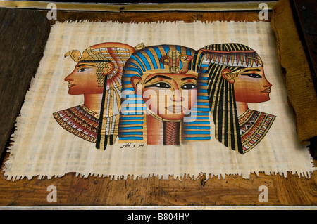 Papyrus manuscripts and paintings “Replica” for sale in a souvenir shop in Khan el-Khalili a major souk in the historic center of Islamic Cairo Egypt Stock Photo