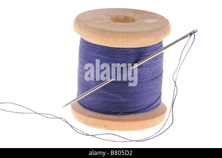 Spool of thread with needle isolated on white background. Sewing thread and  needle Stock Photo - Alamy