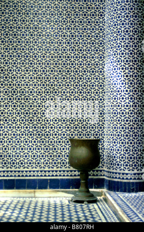 Tiled (zellij tilework) courtyard at the Belghazi Musuem in the heart of the medina, or old town, Fes el-bali, Fes Morocco Stock Photo