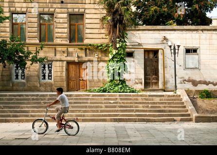 boy on bicyle baku azerbaijan Stock Photo