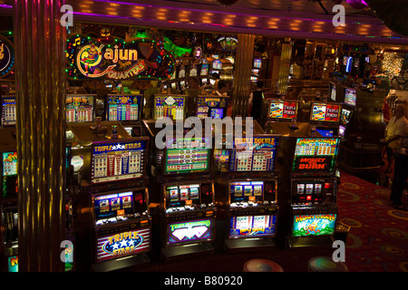 Slot machines in casino on Royal Caribbean Navigator of the Seas cruise ship Stock Photo