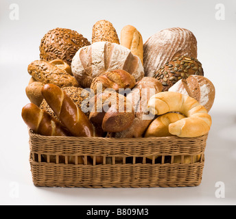 Various types of bread in a basket Stock Photo
