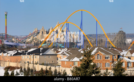 Closed amusement park Wonderland roller coaster with field of snow in ...