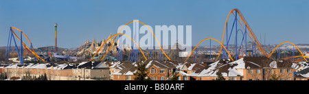 Closed amusement park Wonderland roller coaster with field of snow in ...